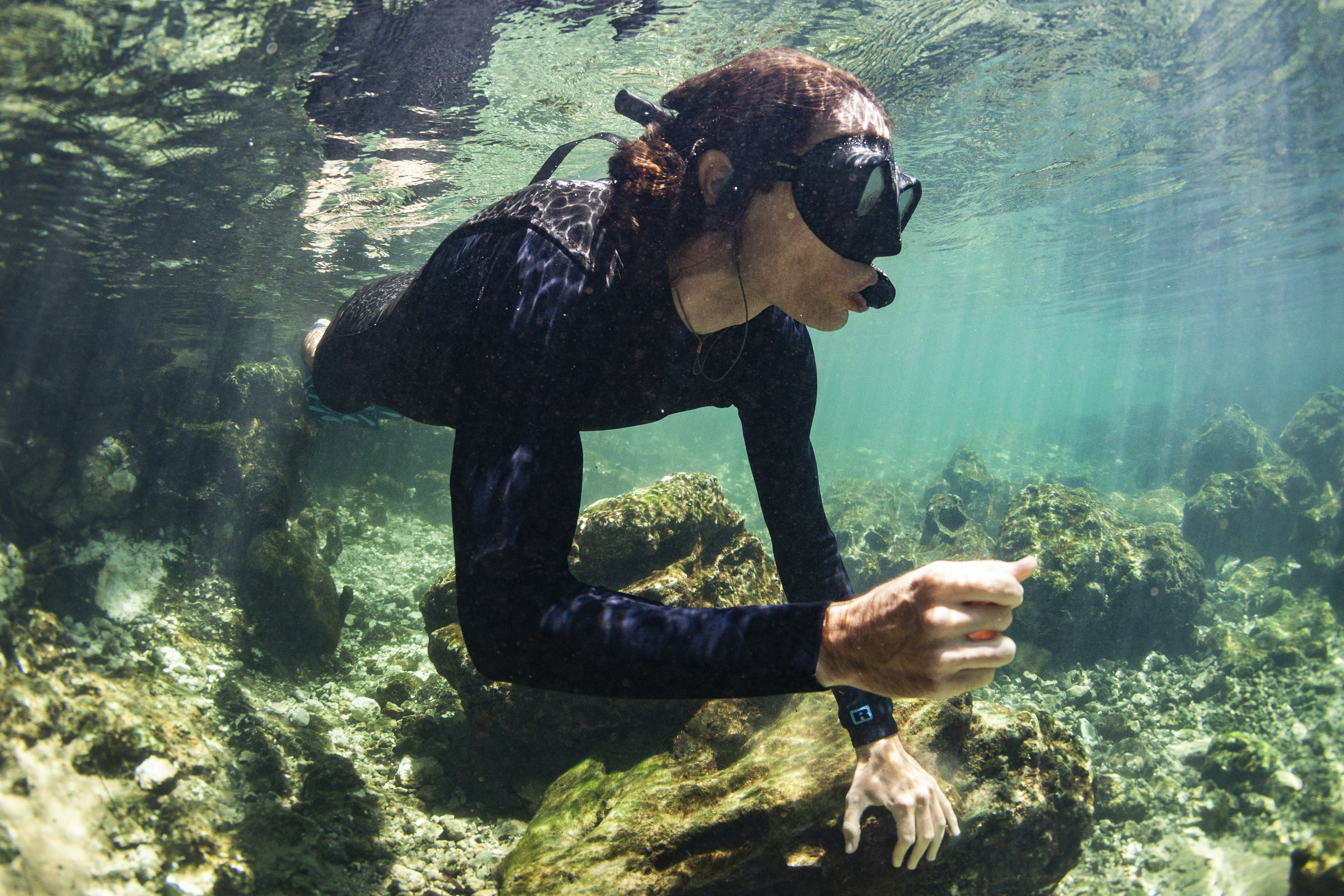 A swimmer at Madison Blue Springs.