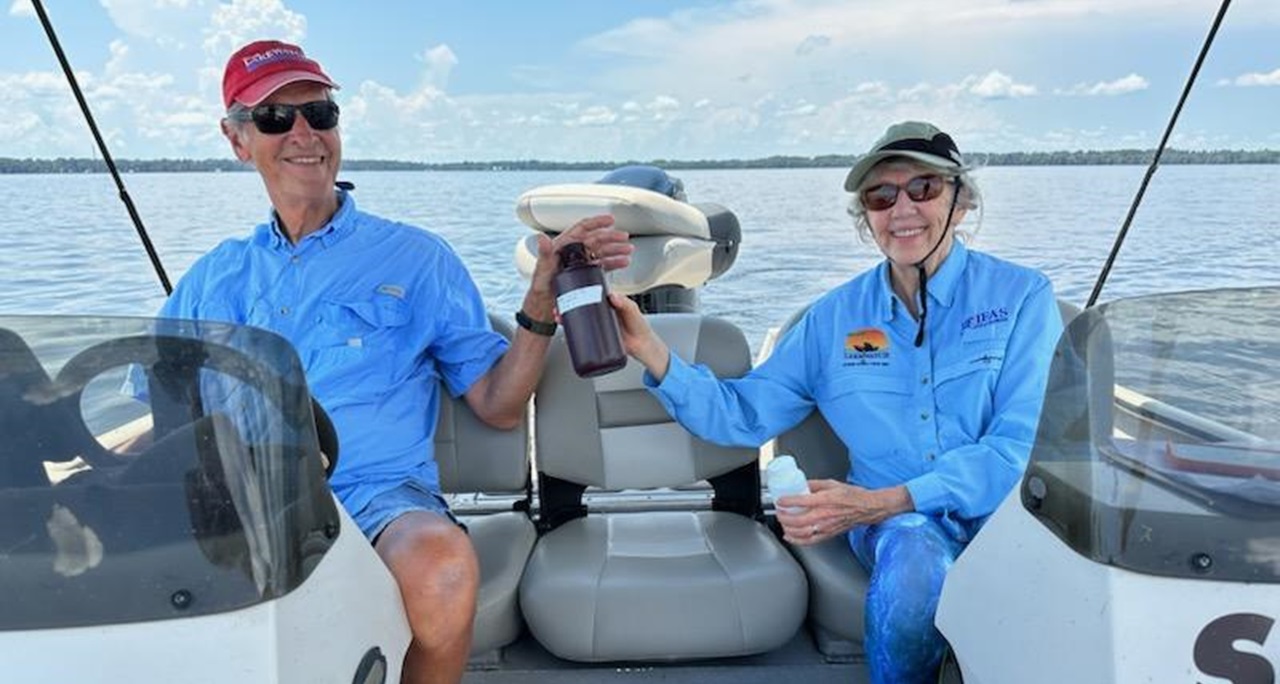 Tom and Peggy Prevost sitting on a boat